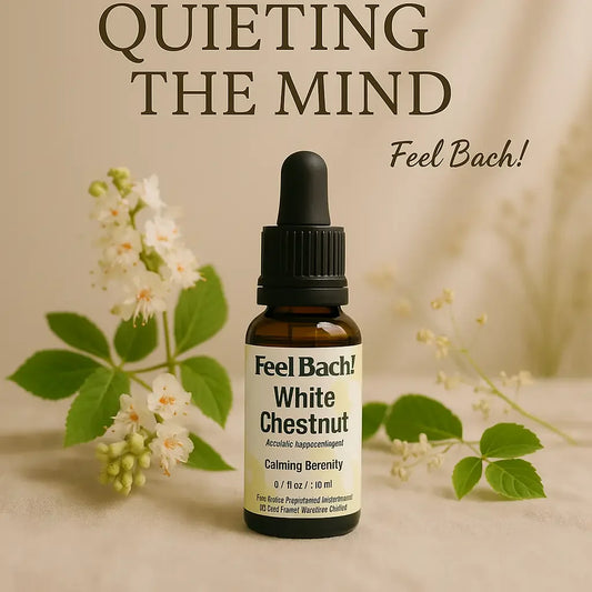 Glass Bach flower remedy bottle labeled 'Quieting the Mind' with chestnut blossoms on a linen-draped table