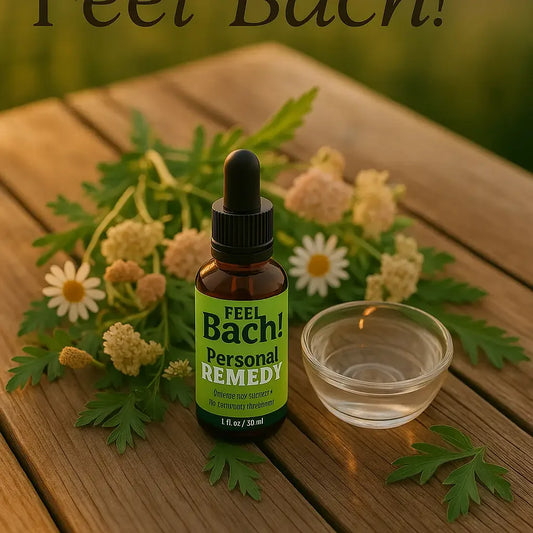 Overhead shot of Feel Bach! bottle on wooden table with wildflowers at golden hour, drops falling into glass bowl