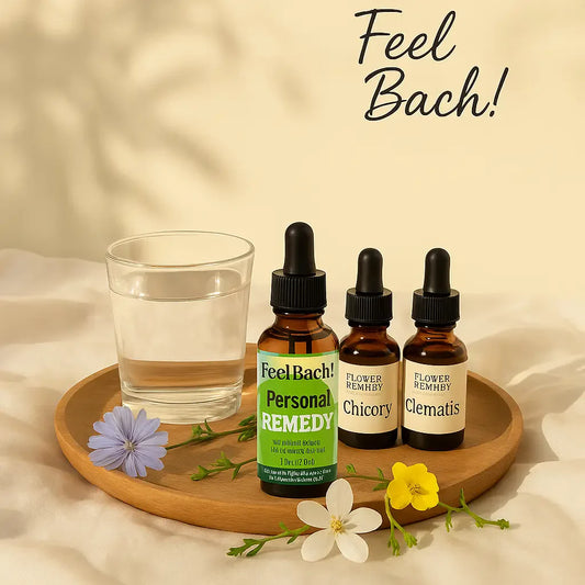 Elegant tray with Feel Bach flower remedy bottles, wildflowers, glass of water, and soft linens in warm morning light